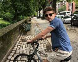 He enjoys riding a bike whenever he gets an opportunity.